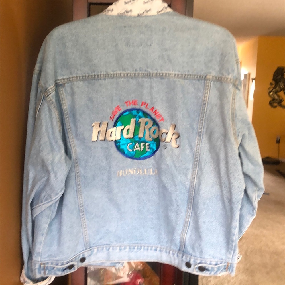 Denim jacket with hard rock Café emblem on back